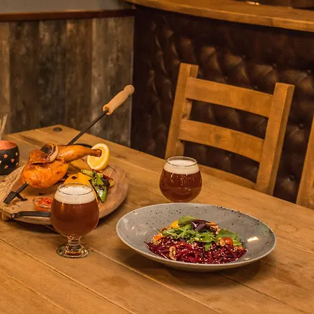 Golden Tulip Отель